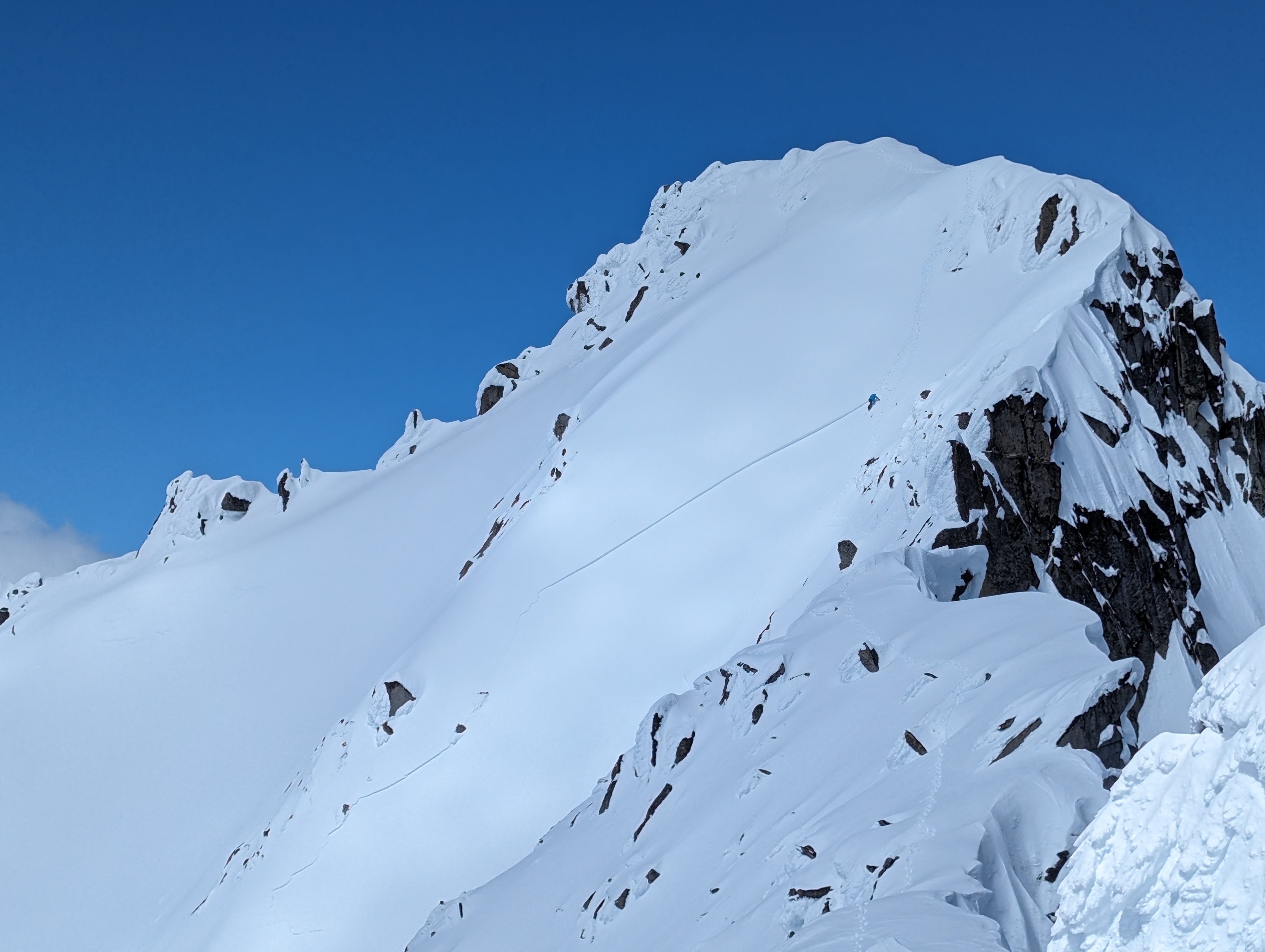 Straddling the Existential Line: Falling Snow and Holding Onto Mt. Stuart